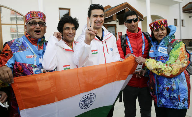 Indian athletes, alpine skier Thakur Himanshu, second left, luger Shiva Keshavan, centre, and cross-country skier Nadeem Iqbal, second right, pause for photos after a welcome ceremony for the Indian Olympic team at the Mountain Olympic Village Indian athletes, alpine skier Thakur Himanshu, second left, luger Shiva Keshavan, centre, and cross-country skier Nadeem Iqbal, second right, pause for photos after a welcome ceremony for the Indian Olympic team at the Mountain Olympic Village